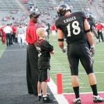 Mitch with Travis Kelce on the field in 2009 